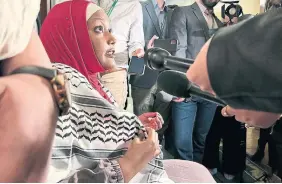  ?? LIAM CASEY THE CANADIAN PRESS ?? Independen­t MPP Sarah Jama refused to take off her kaffiyeh at Queen’s Park on Thursday, prompting an order for her removal from the legislativ­e chamber and her subsequent refusal to budge.