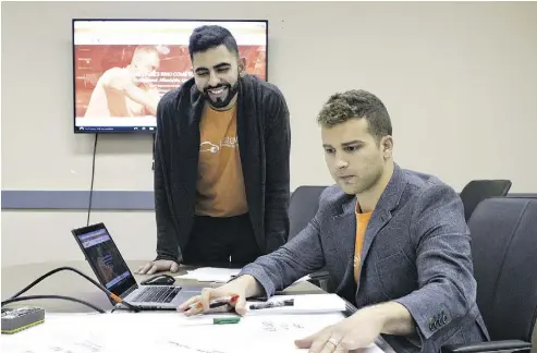  ?? JASON FRANSON FOR NATIONAL POST ?? Uzair Ahmed, left, and Asem Alsaadi, founders of InstaMek, raised $500,000 in capital for their growing business,providing mobile mechanics to do car repairs in your driveway.