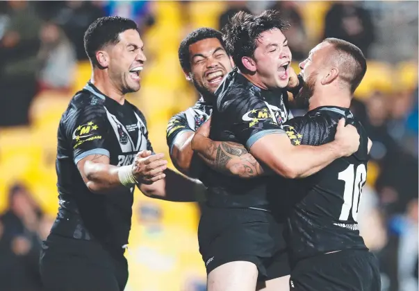  ?? Picture: GETTY IMAGES ?? Brandon Smith celebrates scoring what was to be a disallowed try in last night’s rugby league Test between New Zealand and Australia in Auckland