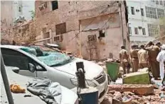  ?? AFP ?? Security forces inspecting the site of a foiled attack in Makkah. Six foreign pilgrims were hurt when a suicide bomber blew himself up, the Interior Ministry said.