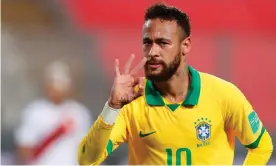  ?? Photograph: Paolo Aguilar/AFP/Getty Images ?? Neymar celebrates after completing his hat-trick for Brazil against Peru.