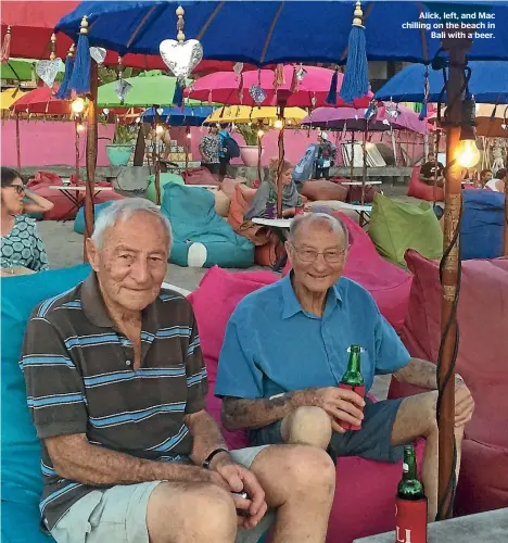  ??  ?? Alick, left, and Mac chilling on the beach in Bali with a beer.