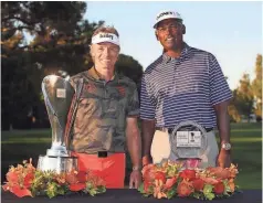  ?? CHRISTIAN PETERSEN/ GETTY IMAGES ?? Bernhard Langer, left, earned the Charles Schwab Cup while Vijay Singh won the tournament.