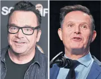  ?? THE ASSOCIATED PRESS ?? Tom Arnold, left, and Mark Burnett got into a scuffle this week as both men entered the Evening Before Emmy party.