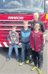  ??  ?? Red Alert
Youngsters met the fire brigade