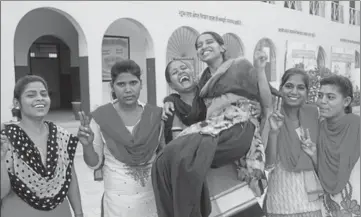  ?? MANOJ DHAKA/HT ?? Students in a celebrator­y mood after Class12 results were declared in Haryana on Thursday.