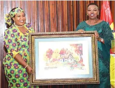  ?? ?? First Lady Dr Auxillia Mnangagwa exchanges gifts with her Kenyan counterpar­t, Mrs Rachel Ruto, during a dinner hosted by their Mozambican counterpar­t, Dr Isaura Nyusi, at the Presidenti­al Palace in Maputo, Mozambique, on Friday