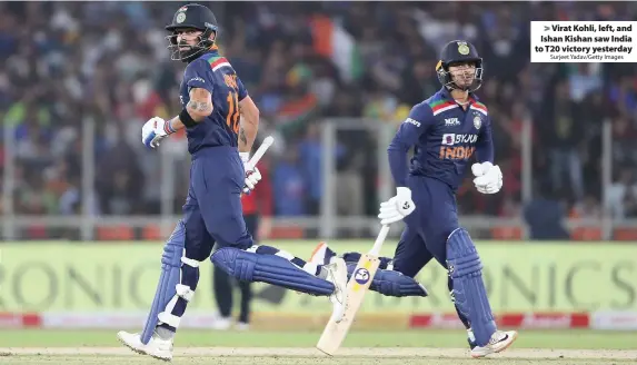  ?? Surjeet Yadav/Getty Images ?? Virat Kohli, left, and Ishan Kishan saw India to T20 victory yesterday
