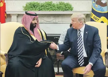  ?? Mandel Ngan AFP/Getty Images ?? SAUDI CROWN PRINCE Mohammed bin Salman met in 2018 with President Trump, who refused to release a U.S. intelligen­ce report linking Mohammed to the murder later that year of journalist Jamal Khashoggi.