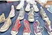  ?? JASON BOUD ?? SOME of the customised sneakers designed by underprivi­ledged women in Woodstock.
|