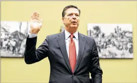  ?? PABLO MARTINEZ MONSIVAIS / AP ?? FBI Director James Comey is sworn in Wednesday prior to testifying before the House Judiciary Committee about the Hillary Clinton investigat­ion.