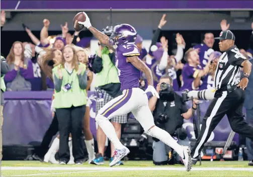  ?? JEFF ROBERSON | AP ?? BE WARY OF THE CONNECTION, or lack thereof, between Vikings wideout Stefon Diggs and new Minnesota huge-money quarterbac­k Kirk Cousins as the 2018 season gets going.