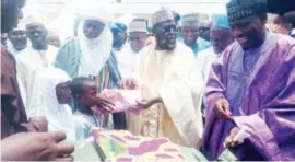  ?? ?? From left: Agabe of Gwargwarda, Alhaji Hussaini Agabi Mam; National Chairman, Jama’atu Izalatil Bidah Wa Iqamatis Sunnah (JIBWIS), Sheikh Abdullahi Bala Lau, (second right) with others during the closing of the 1443 Tafsir and donation of food items to the needy in Abuja yesterday Photo: Abbas Jimoh