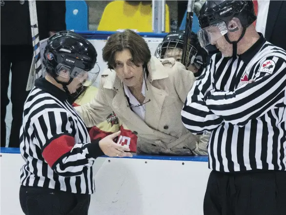  ??  ?? Canadian-born Digit Murphy is head coach of the CWHL’s Kunlun Red Star based in Shenzhen, a city of 12 million in China. They are playing for the Clarkson Cup this weekend in Markham, Ont.