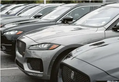  ?? David Zalubowski / Associated Press ?? New vehicle sales across the Houston region plunged 17 percent in April from a year ago as interest rates on new financed vehicles reached a 10-year high, averaging 6.3 percent last month.