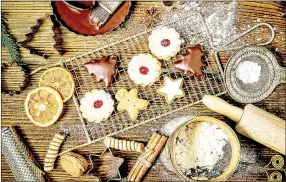  ?? PHOTO BY METRO CREATIVE ?? Holiday baking doesn’t have to add to seasonal stress. With these tips and shortcuts, there will be plenty of sweet treats for the family.