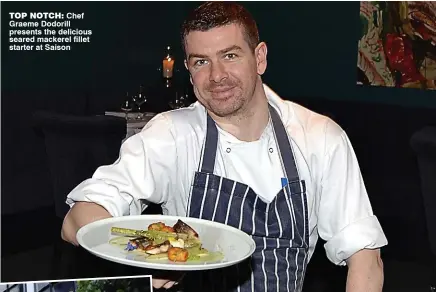  ??  ?? top notch: Chef Graeme Dodorill presents the delicious seared mackerel fillet starter at Saison