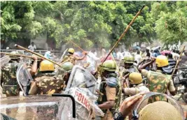  ??  ?? Police personnel baton charge at protestors who were demanding the closure of Vedanta’s Sterlite Copper unit, in Tuticorin, on Wednesday