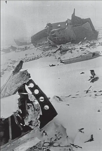  ??  ?? The aftermath: Wreckage from the crashed Air New Zealand DC10 litters the slopes of Mt Erebus, days after the crash.