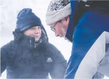  ?? MARK FERGUSON ?? During her trip across North America, climate activist Greta Thunberg met with University of Saskatchew­an water scientist John Pomeroy at a field research site on the Athabasca Glacier in Jasper, Alta.