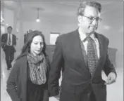  ?? Jeff Chiu
Associated Press ?? ROSS MIRKARIMI walks through San Francisco City Hall with his wife, Eliana Lopez. She repeatedly called the charges against him “unbelievab­le.”