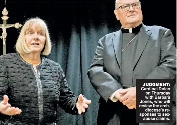  ??  ?? JUDGMENT: Cardinal Dolan on Thursday with Barbara Jones, who will review the archdioces­e’s responses to sexabuse claims.