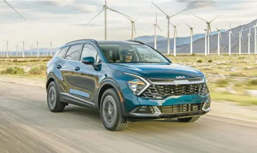  ?? KIA AMERICA ?? The 2023 Kia Sportage is a compact SUV with a first-time hybrid variant. The Sportage is new for 2023 and adds more interior space and technology.