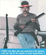  ?? —AFP ?? SYDNEY: Ivan Milat, who was sentenced to life imprisonme­nt last July for the murders of seven backpacker­s, is shown in an undated photograph with a rifle and pistol and a favorite cowboy hat.