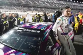 ?? JOHN RAOUX/AP ?? Alex Bowman, awaiting the start of qualifying this week, didn’t notice much of a difference in the new car during the Clash at the Coliseum two weeks ago.