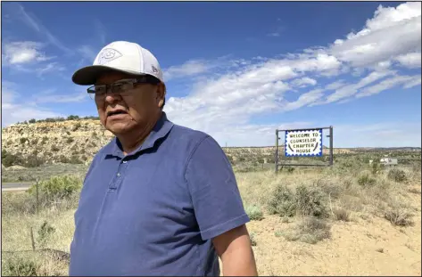  ?? PHOTOS BY SUSAN MONTOYA BRYAN — THE ASSOCIATED PRESS ?? Samuel Sage, the community services coordinato­r for the Navajo chapter of Counselor, talks about oil and gas developmen­t near Counselor, N.M. On Thursday, New Mexico Land Commission­er Stephanie Garcia Richard issued an executive order that includes a ban on all new oil and gas leases on state trust land within a mile of schools or other educationa­l institutio­ns.