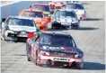  ?? GREG M. COOPER, US PRESSWIRE ?? Denny Hamlin heads to a win Sunday at New Hampshire Motor Speedway.