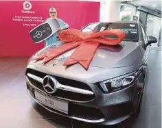  ??  ?? SITI Nurbaini memenangi Mercedes-Benz A200 sempena Peraduan Pelancaran DuitNow oleh PayNet, kelmarin.