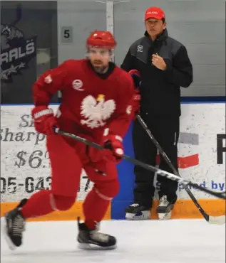  ?? BARRY GRAY, THE HAMILTON SPECTATOR ?? The Polish National Hockey Team practised Thursday in Stoney Creek, under the watchful eye of coach Ted Nolan.