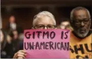  ?? PHOTOS BY J. SCOTT APPLEWHITE — THE ASSOCIATED PRESS ?? Ellen Sturtz, an activist from the antiwar group CodePink, participat­es in a silent protest during the Senate Armed Services Committee hearing on the detention center in Guantanamo, Cuba, on Thursday in Washington. A week ago, the same group drew the...