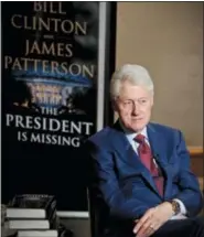  ?? THE ASSOCIATED PRESS ?? Former President Bill Clinton listens during an interview Monday about a novel he wrote with James Patterson, “The President is Missing,” in New York.
