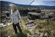  ?? JIM WEBER — SANTA FE NEW MEXICAN ?? Johnny Trujillo, 53, talks about battling a blaze that destroyed both his sister's home and his truck in the evacuation area near Mora, N.M., on Wednesday.