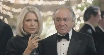  ?? CRAIG BLANKENHOR­N/HBO ?? Michelle Pfeiffer stars as Ruth Madoff, left, and Robert De Niro is Bernie Madoff in director Barry Levinson’s The Wizard of Lies, which will première Saturday on HBO.