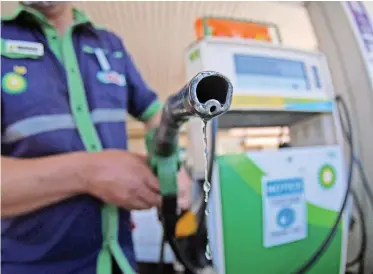  ?? IAN LANDSBERG African News Agency (ANA) ?? FUEL prices were trending higher before the widespread looting and unrest of the past week. But the daily rand/dollar exchange rate has spiked from R14.35 to nearly R14.80 since June 12, the Automobile Associatio­n said. |