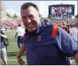  ?? CHARLES REX ARBOGAST ?? Illinois head coach Bret Bielema celebrates the team’s 30-22 win over Nebraska after an NCAA college football game Saturday, Aug. 28, 2021, in Champaign, Ill.