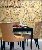  ??  ?? A variety of midcentury styles and colors blossom on today’s wallpaper patterns.