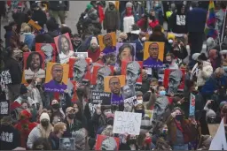  ?? JEFF WHEELER/MINNEAPOLI­S STAR TRIBUNE ?? Hundreds of people gather in the street outside the Hennepin County Government. Center for a rally after the news of a guilty verdict in the trial of Derek Chauvin on Tuesday afternoon in Minneapoli­s.