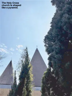  ??  ?? The Holy Cross church is shaped like a pyramid.