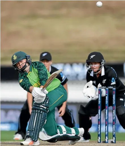  ?? PHOTOSPORT ?? South Africa captain Dane van Niekerk hits out in hope against the White Ferns in Hamilton yesterday.