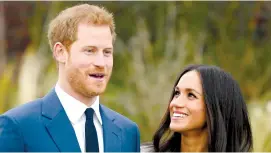  ?? (Toby Melville/Reuters) ?? BRITAIN’S PRINCE HARRY and his fiancée, actress Meghan Markle, pose yesterday at Kensington Palace in London.