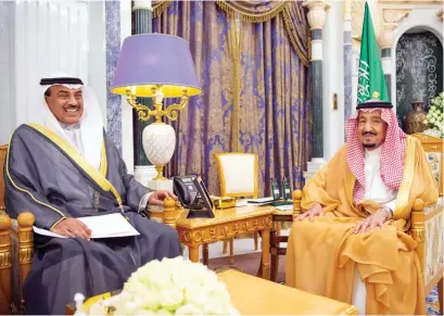  ?? SPA ?? King Salman meets Sheikh Sabah Khalid Al-Hamad Al-Sabah, Kuwait’s deputy prime minister and foreign minister, in Riyadh on Wednesday.