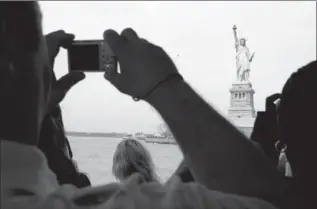  ?? PHOTOS.COM ?? The Staten Island Ferry is free, and it includes a spectacula­r tour of the city’s harbour.