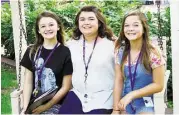  ?? Cy-Fair ISD ?? Labay Middle School eighth-graders Mary Lillard, left, Lindsey Ford and Kinley Parrish look forward to seeing their performanc­e in the Annie Moses Band special “The Art of the Love Song,” set to air in March.