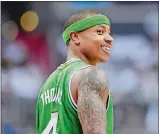  ?? NICK WASS/ AP FILE PHOTO ?? Boston Celtics guard Isaiah Thomas smiles during the first half in Game 4 of a secondroun­d NBA playoff series against the Washington Wizards on May 7.