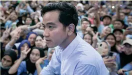  ?? AFP FILE PHOTO ?? THE SON ALSO RISES
Gibran Rakabuming Raka attends an election campaign at the Gelora Bandung Lautan Api Stadium in the city of Bandung, West Java province, southweste­rn Indonesia on Feb. 8, 2024.
