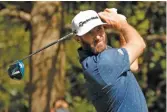  ?? GETTY IMAGES ?? Dustin Johnson is looking to become the fourth golfer to win consecutiv­e Masters.